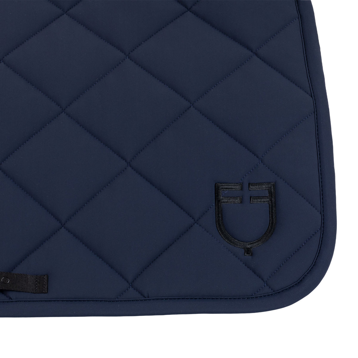 Jumping saddle pad with diamond quilting and embroidered logo
