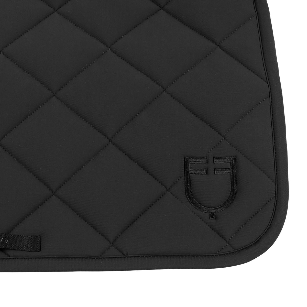 Jumping saddle pad with diamond quilting and embroidered logo