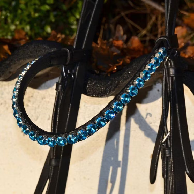 Blått pannband med stora stenar