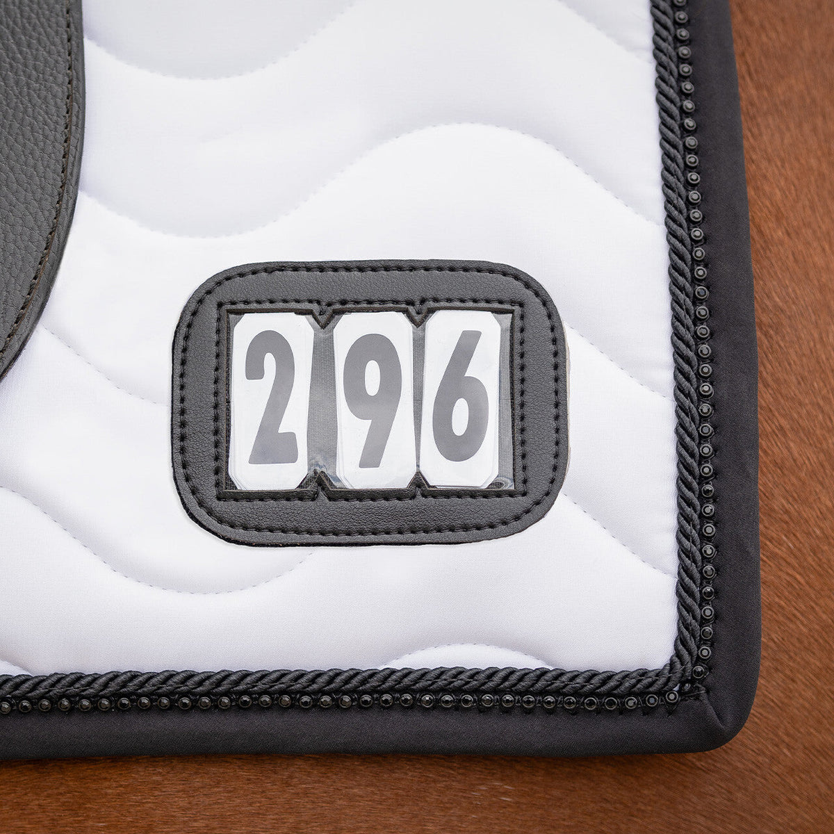 Saddle pad Number