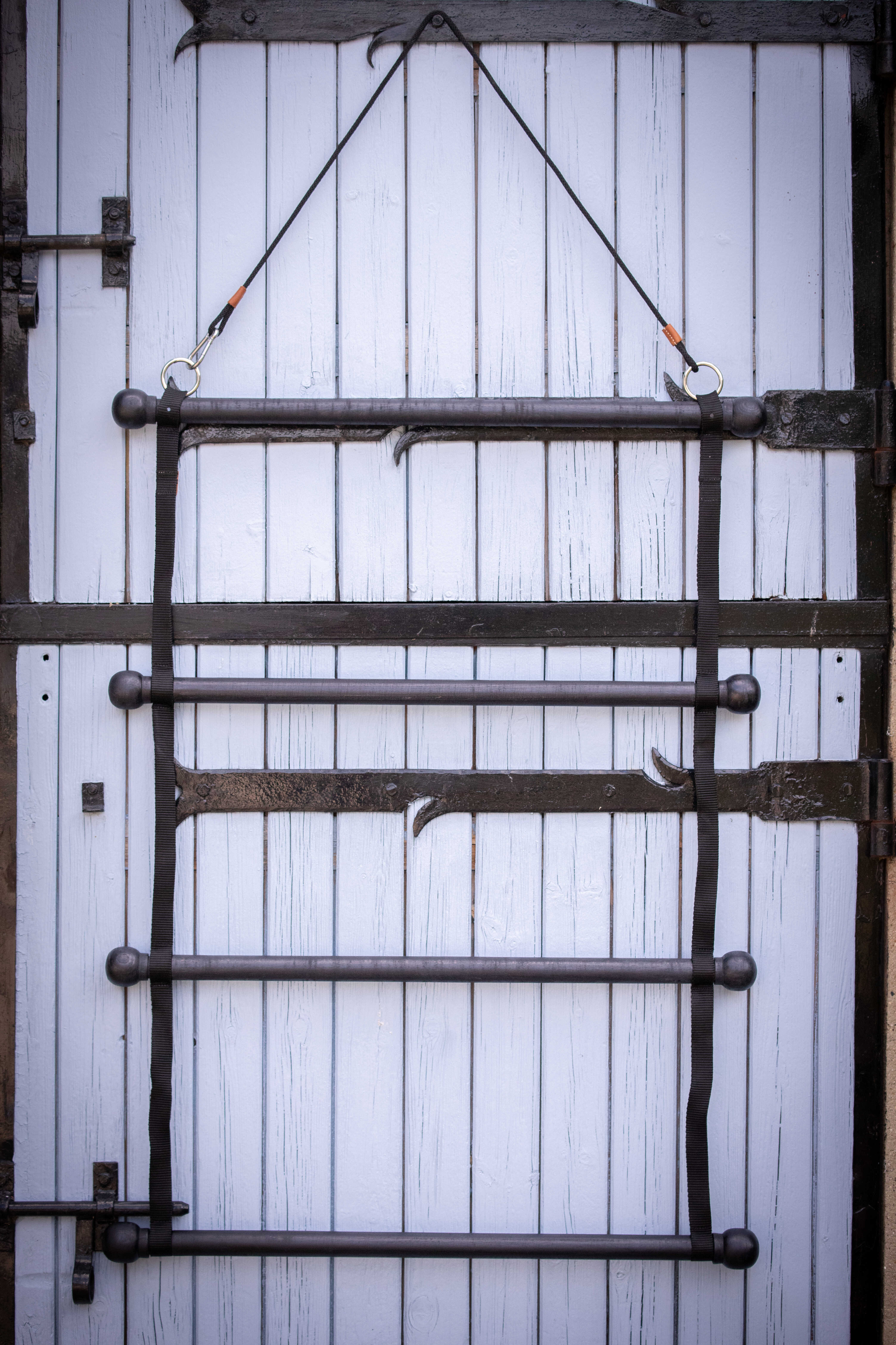 PADDOCK Saddle pad holder