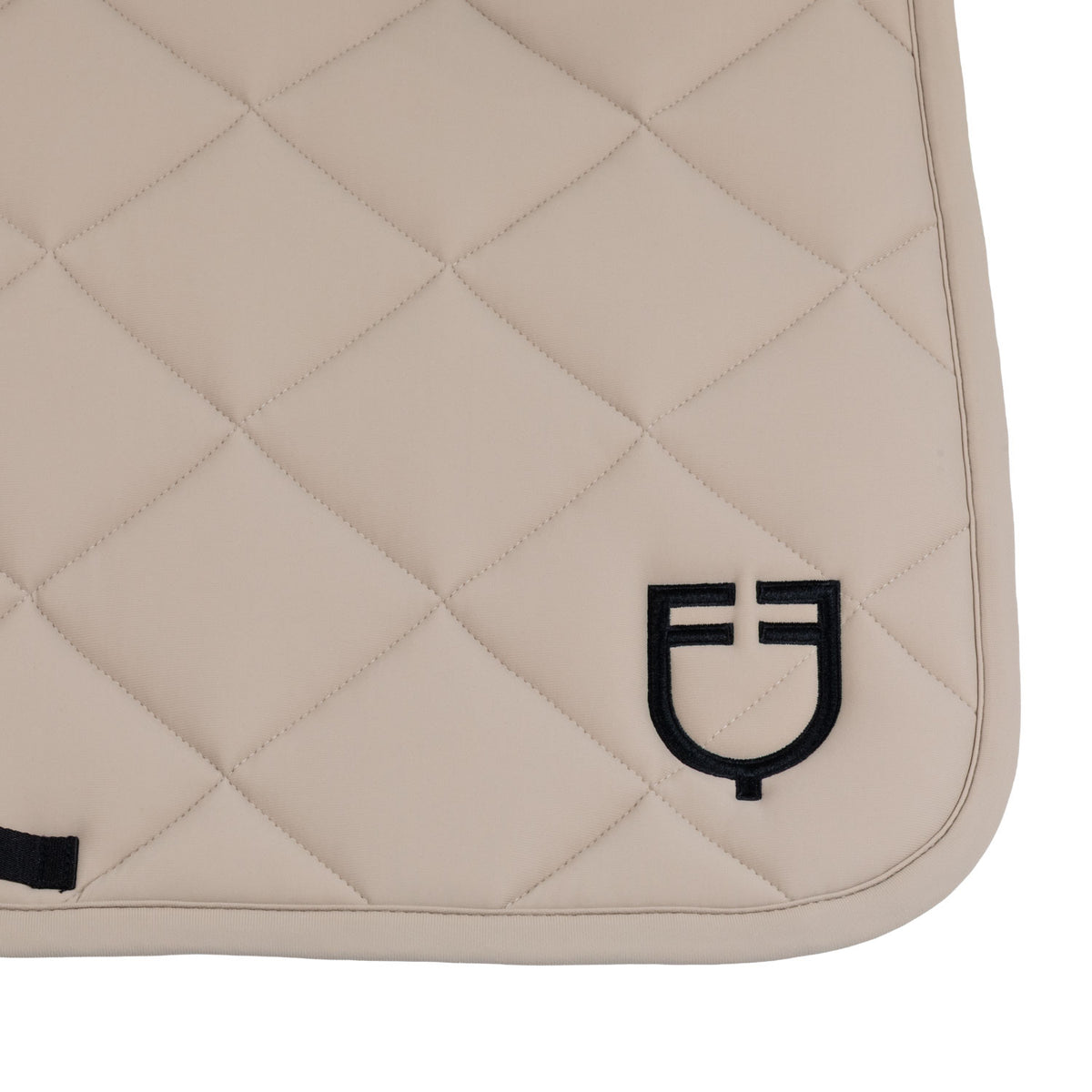 Jumping saddle pad with diamond quilting and embroidered logo