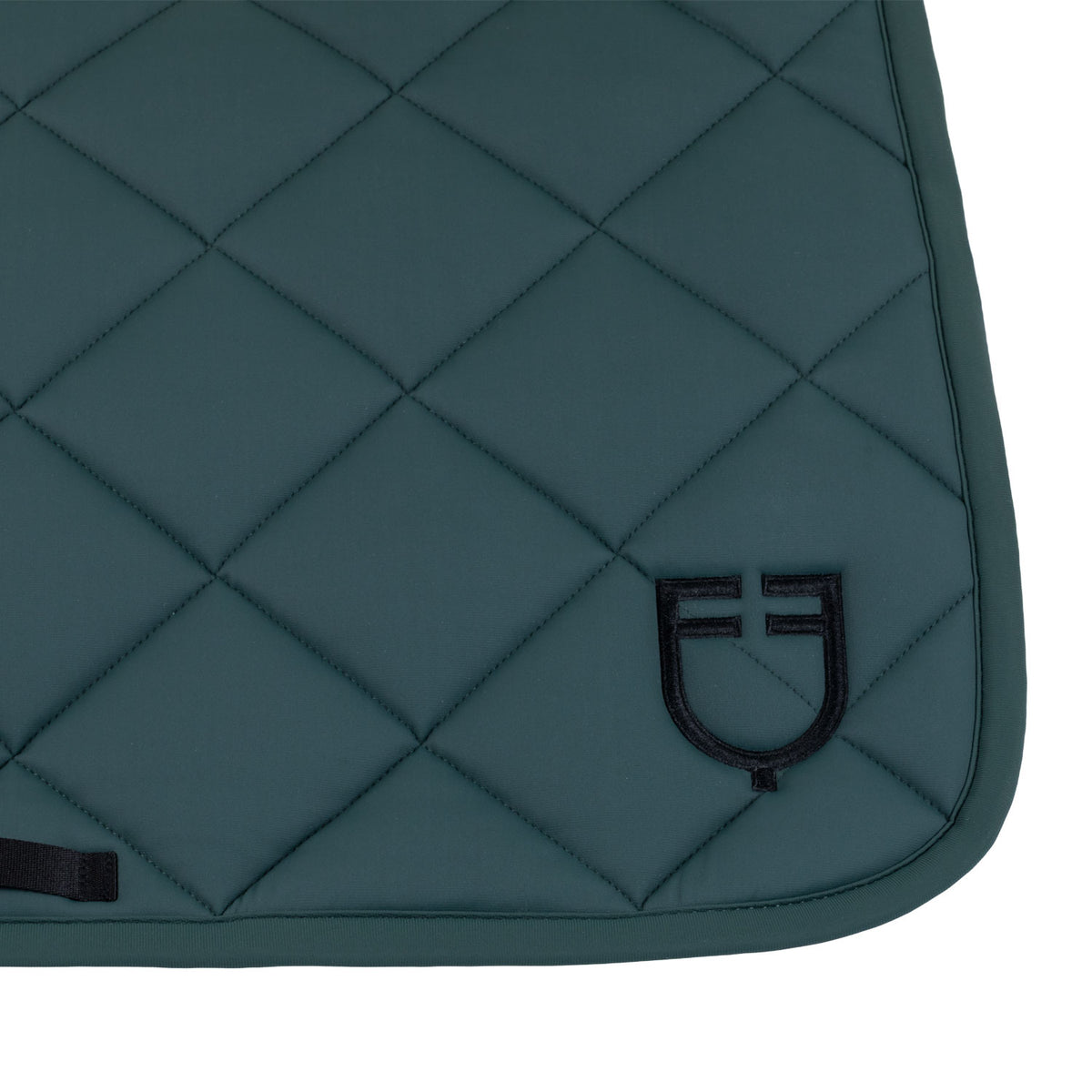 Jumping saddle pad with diamond quilting and embroidered logo