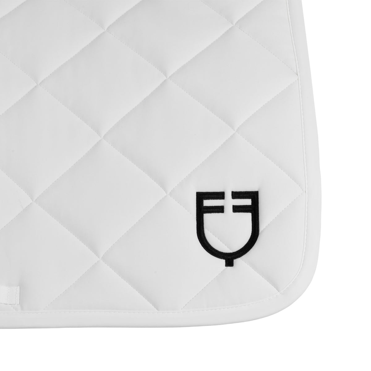 Jumping saddle pad with diamond quilting and embroidered logo