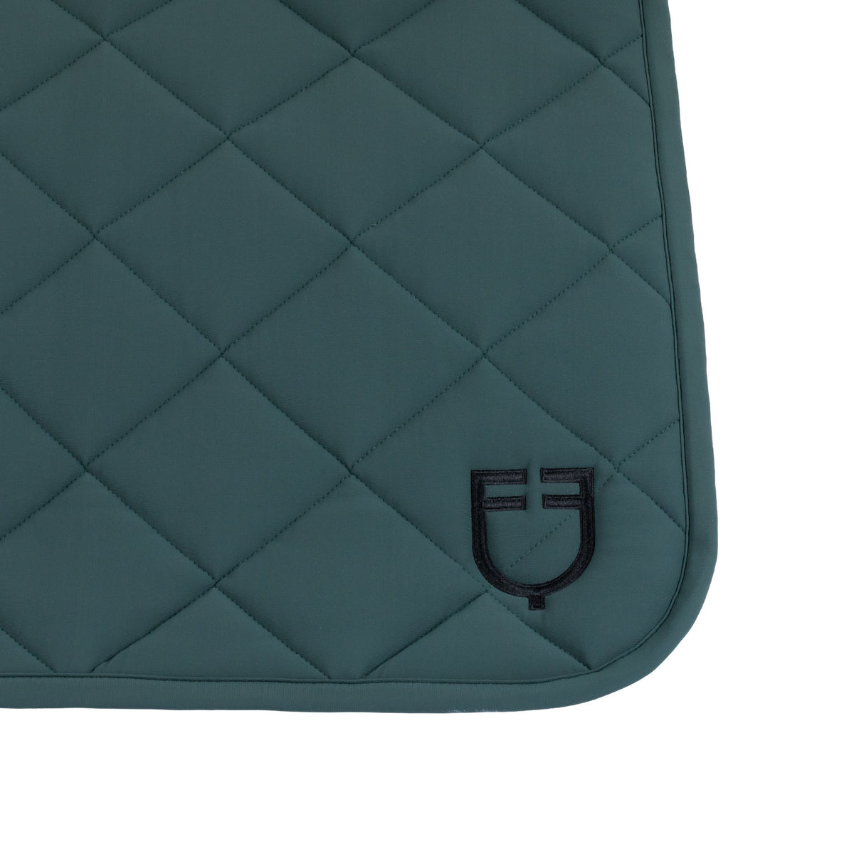 Dressage saddle pad with diamond quilting and embroidered logo